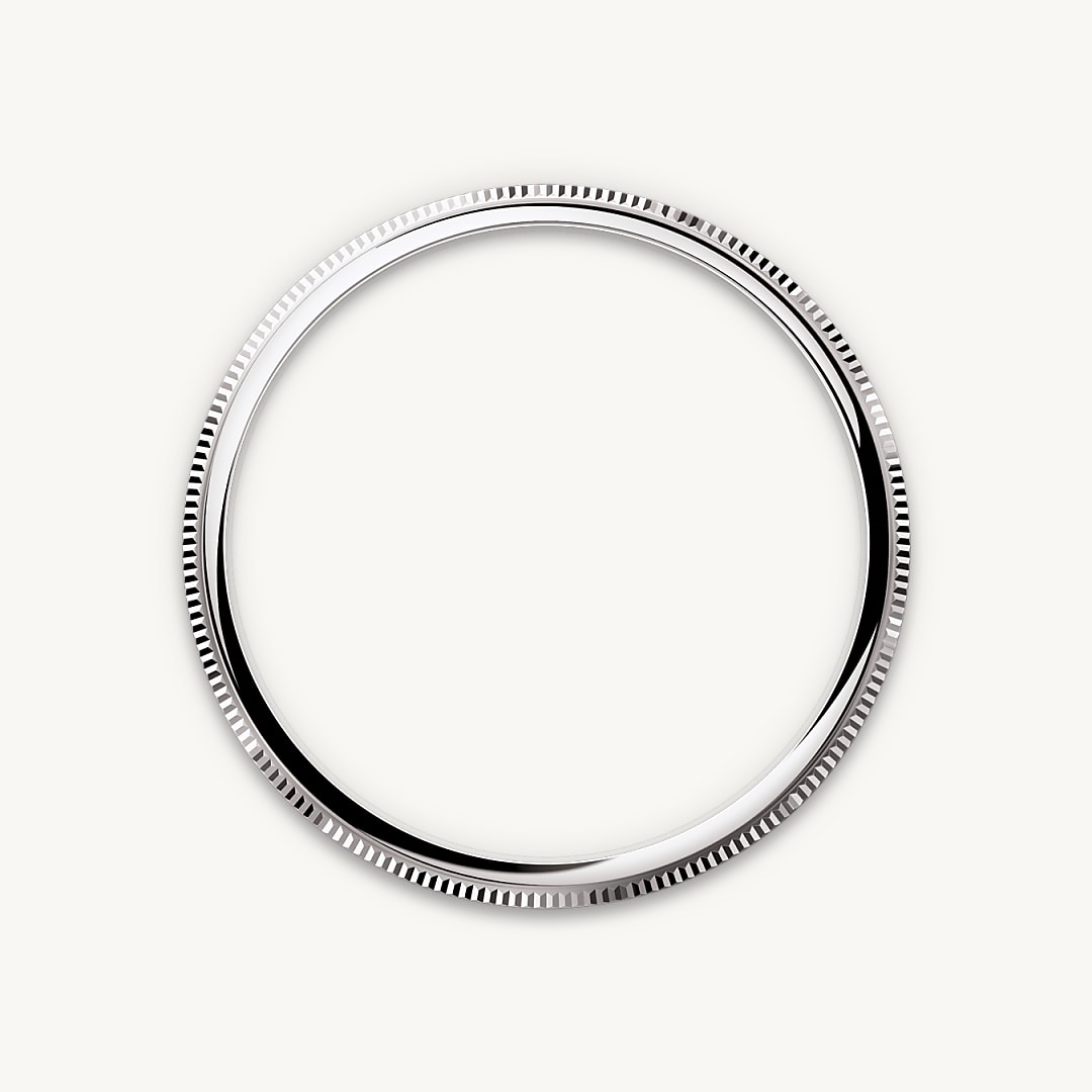 Bombierte und geriffelte Lünette