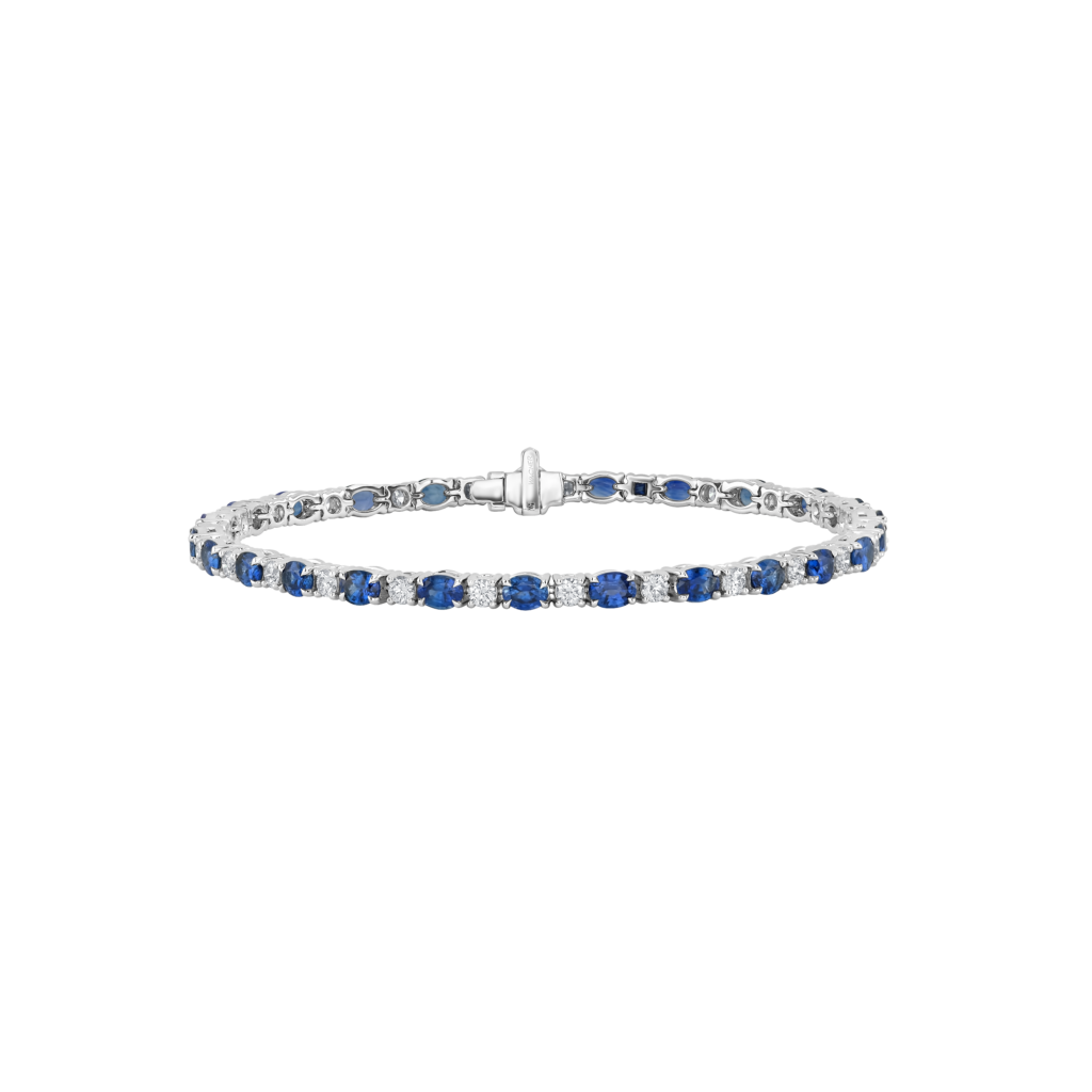 Signature Armband aus 18 Kt Weißgold mit Diamanten und blauem Saphir