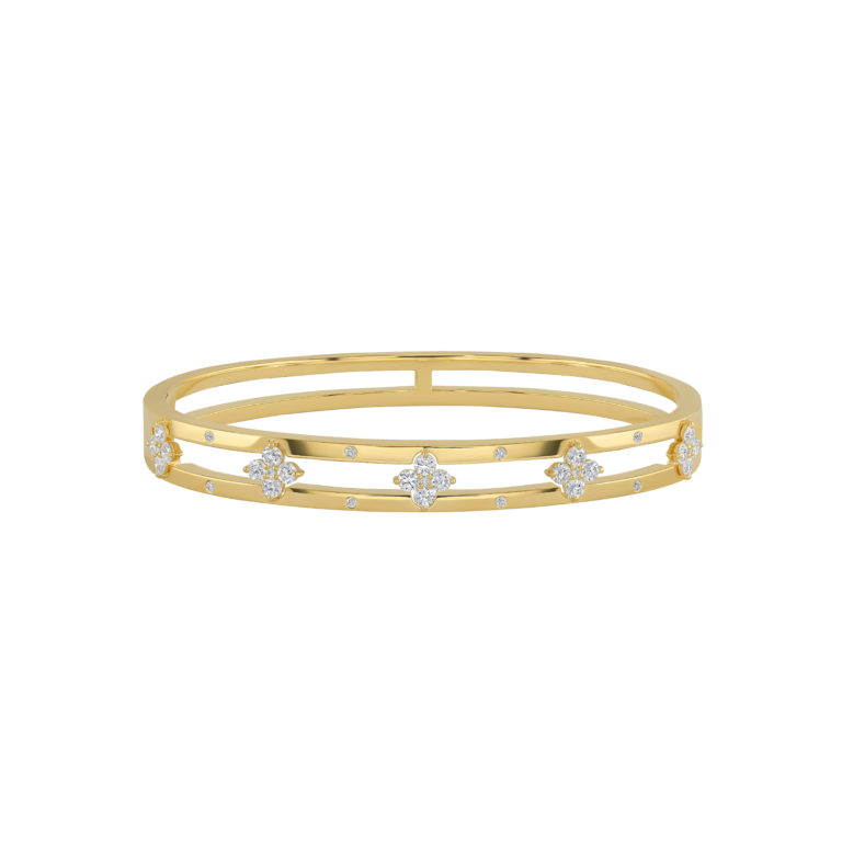 Signature Armreif aus 18 Kt Gelbgold mit Diamanten
